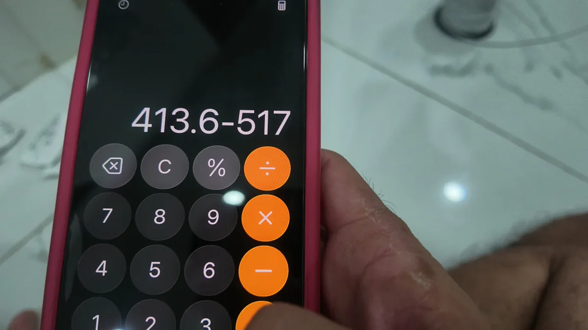 계산기 화면에 413.6과 517